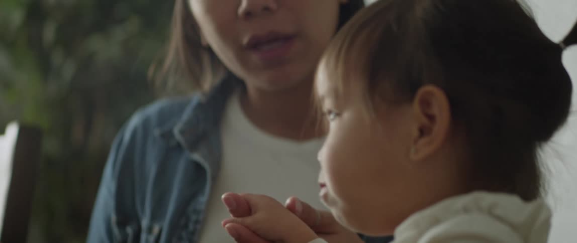 A mother and daughter are talking