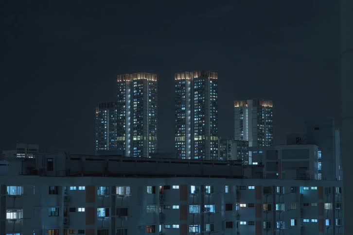 Time lapse of the night lights turning on within buildings in the city skyline