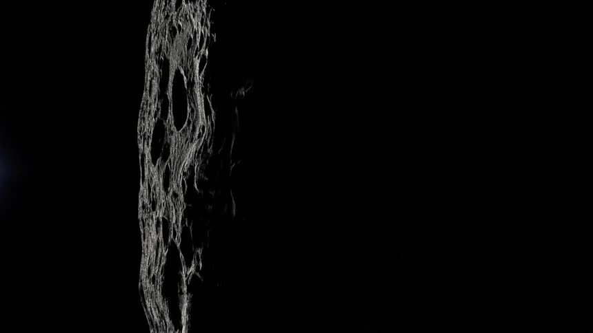 Light from the sun shines on a warped image of the moon as the craters are visible