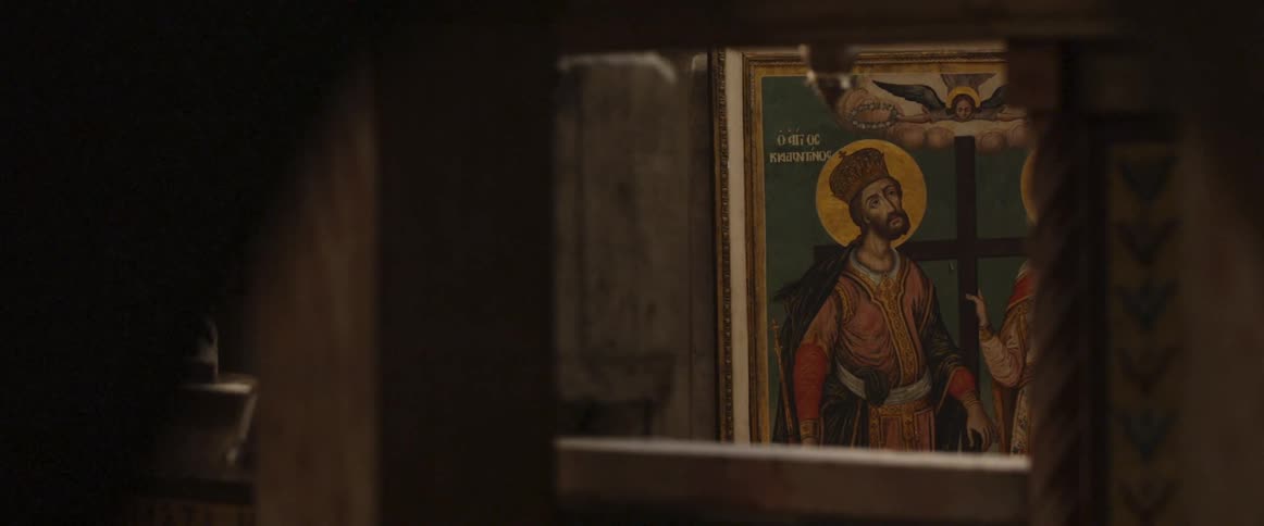 A religious sign is on the wall