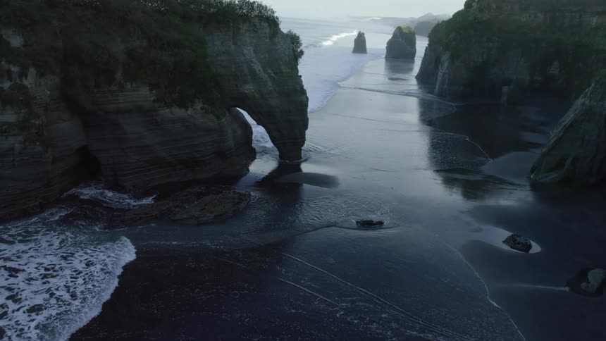 The view is of the ocean and you can see the cliff