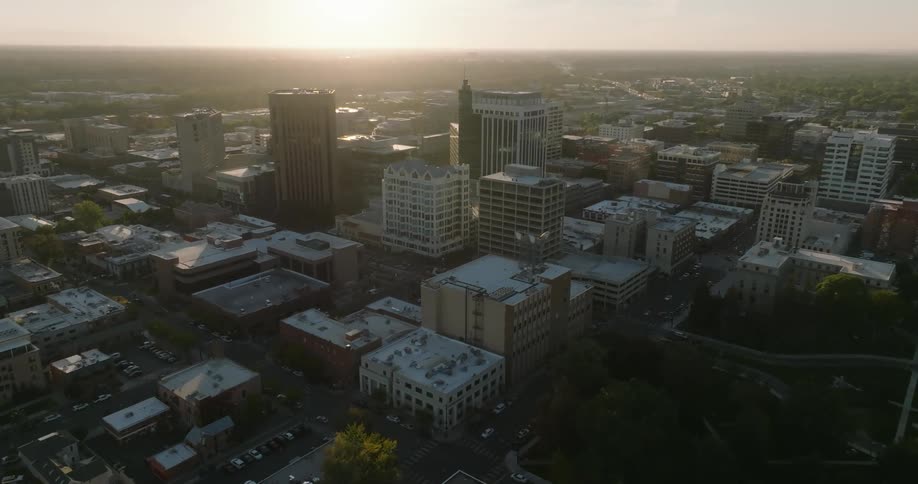 An aerial view of a city with tall buildings