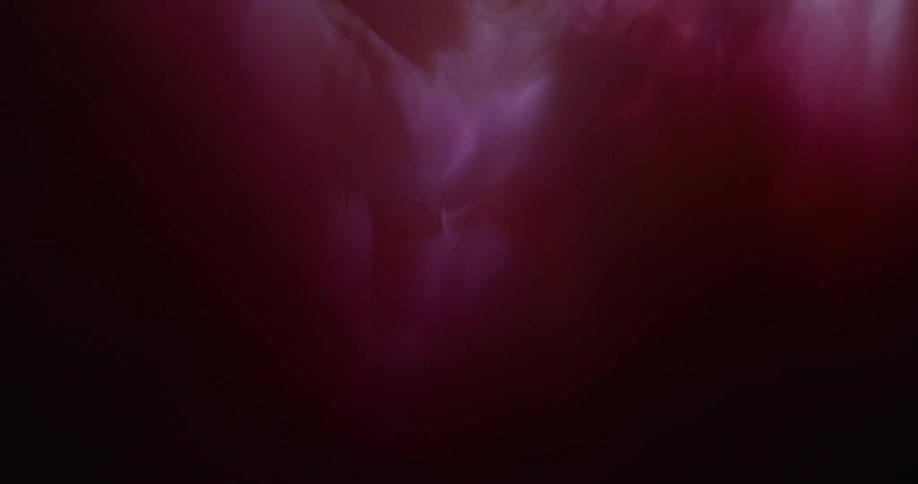 Abstract unknown underwater floaty objects with pink light and shadow moving across