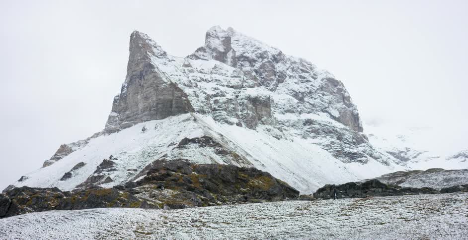 A snow covered mountain peak