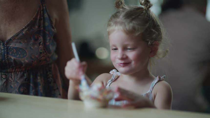 A child is happy to eat ice cream