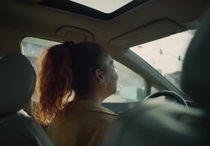 A woman driving a car