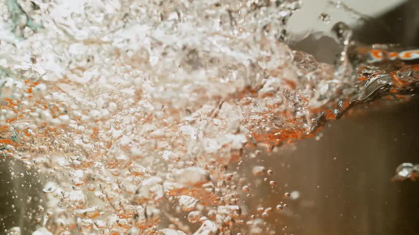 Carrots are dropped into the water