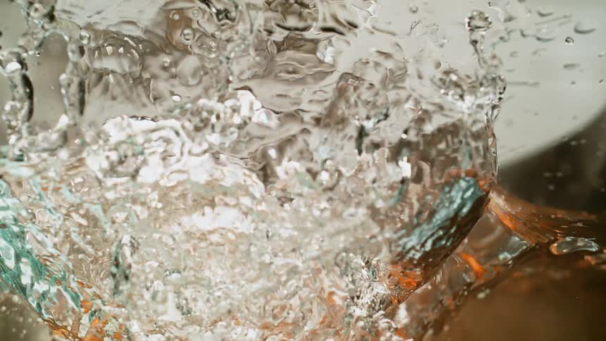 Carrots fall into water