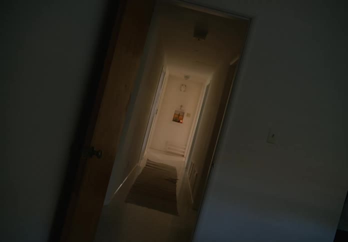 The hallway is dark
