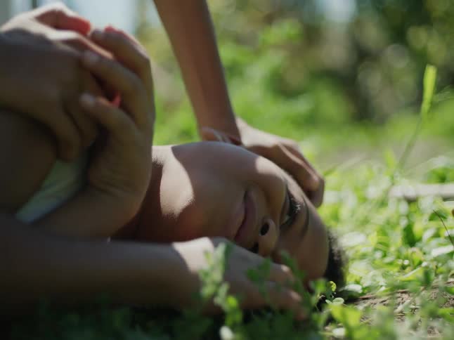 Two children are wrestling