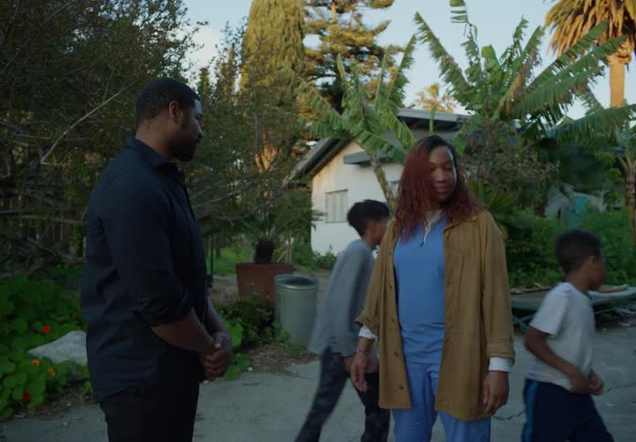 Parents talk in the yard