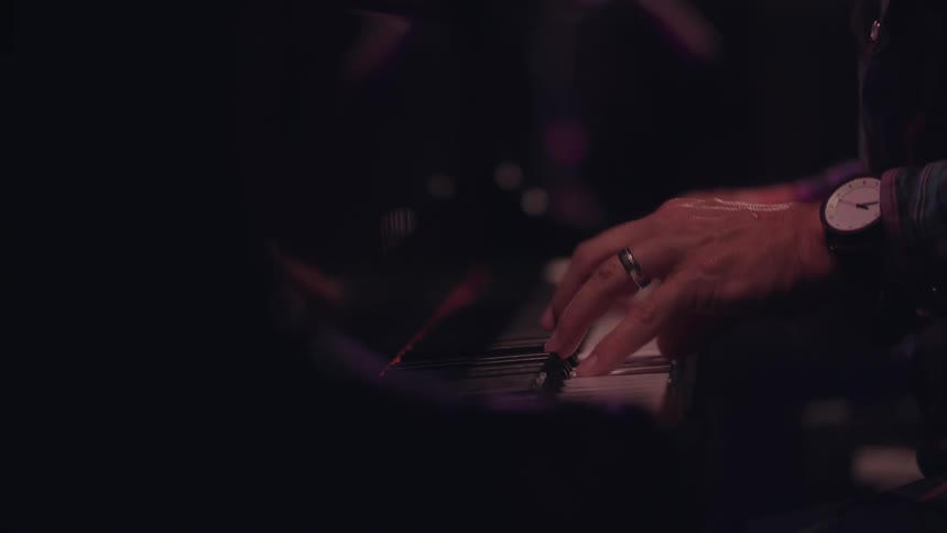 A person is playing the piano