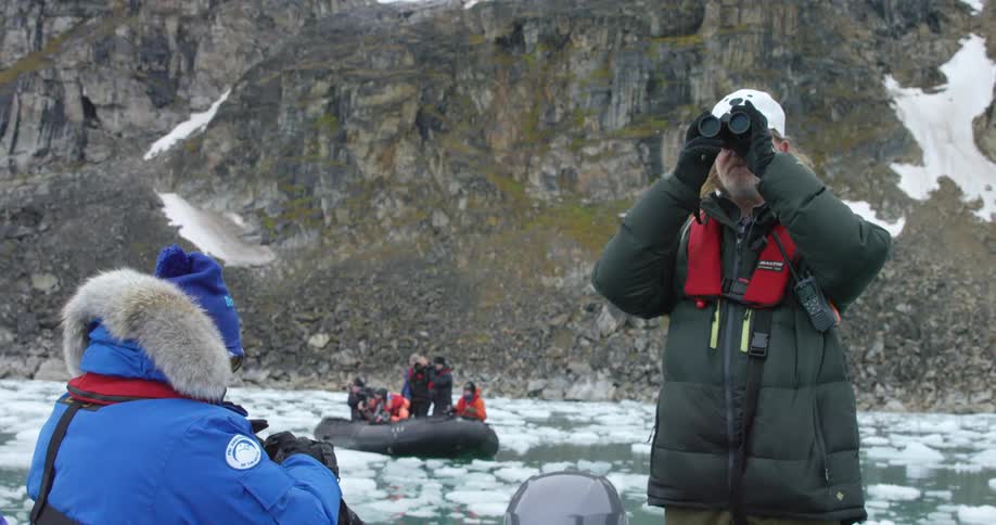 People exploring an icy wilderness
