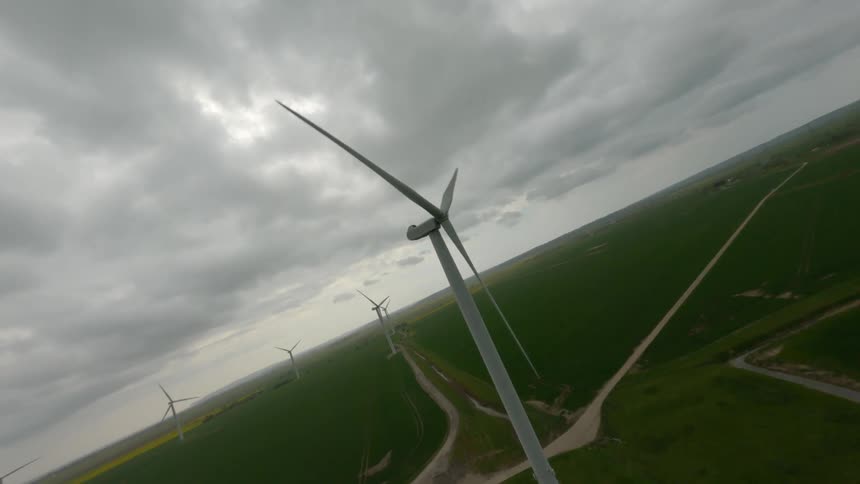 The windmills are running on the field