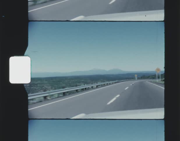 A car is driving on the highway