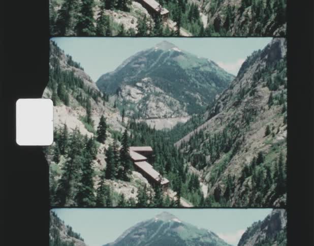Storage containers are between the mountains