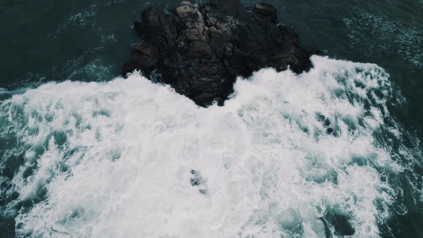 Waves crash on the rocks