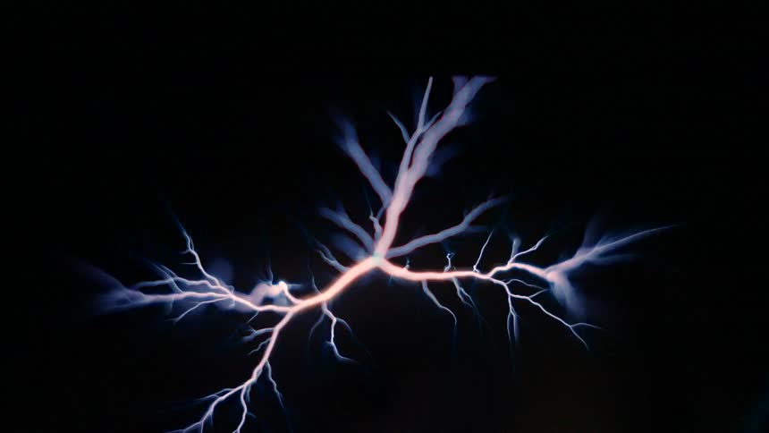 Lightning twists and rotates and glows in purple and pink as it moves wildly in the darkness