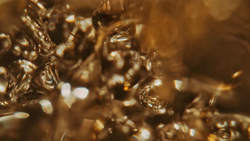 The gold bubbles move around