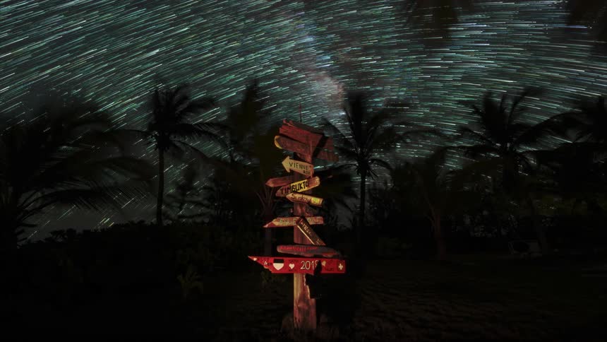 The stars move over the directional sign