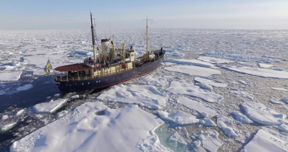 Ship moving through some icy waters