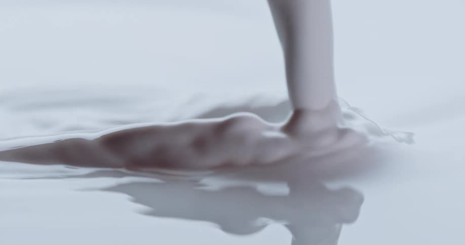 White liquid pours all over
