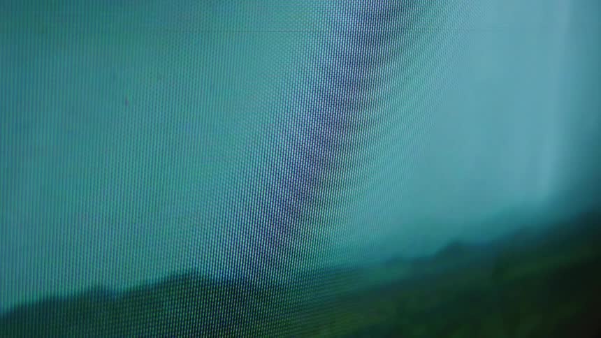 Close up of television screen showing lightnings