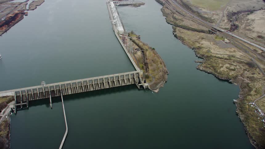 An aerial view of a river and dam