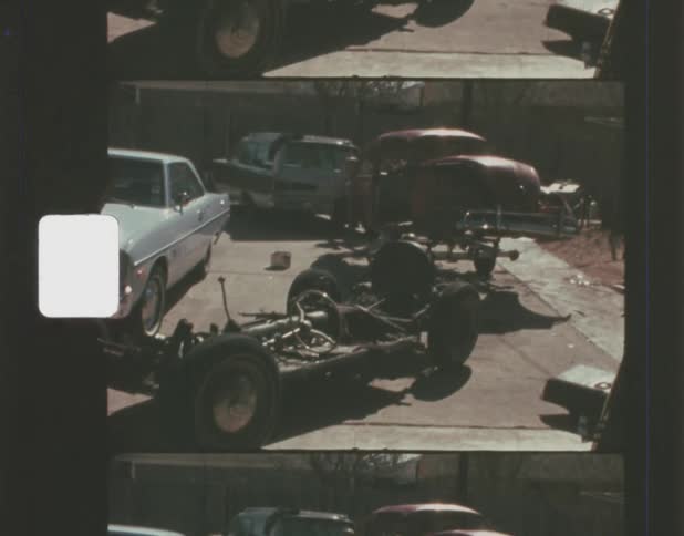 The view is of a small town and you can see all these vehicles