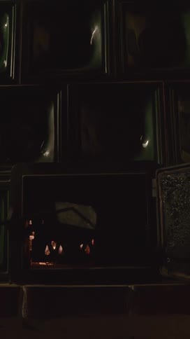 Burning flaming wood inside a furnace and the door is closed