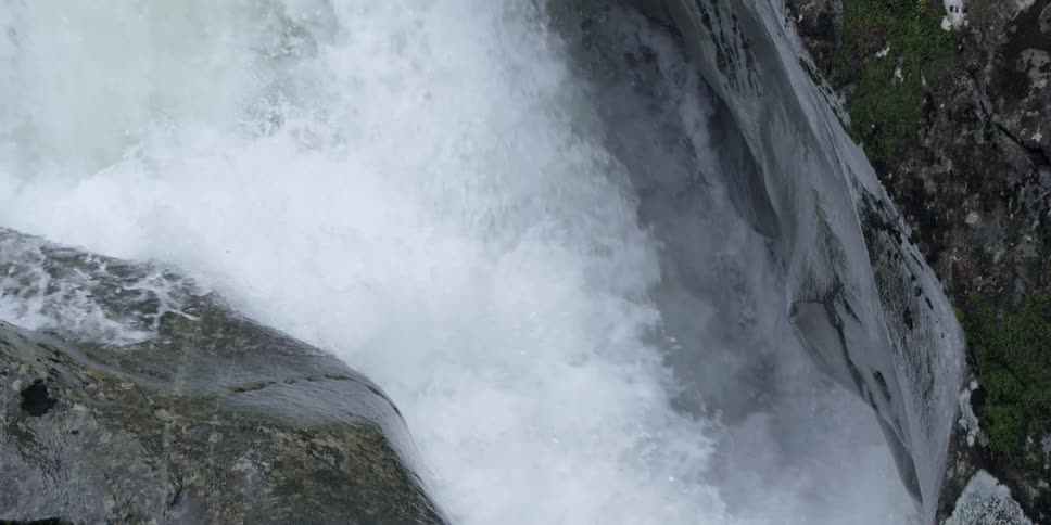 River rapids flowing between cliffs
