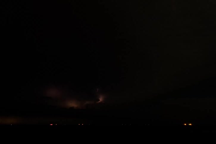 Lightning flashes in a stormy sky