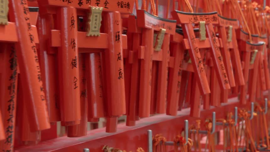 Small orange archways hanging from hooks
