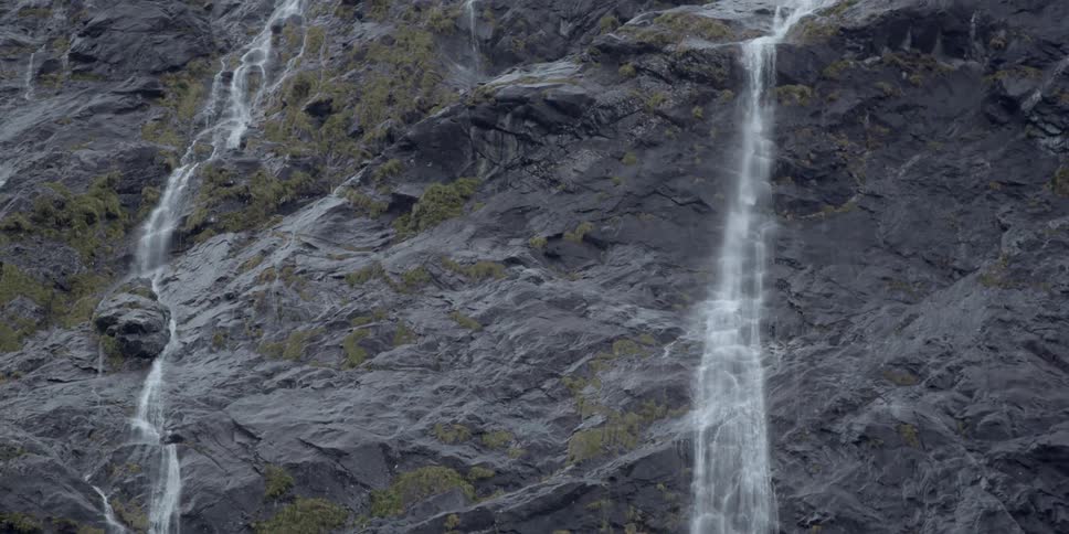 A high, rocky waterfall