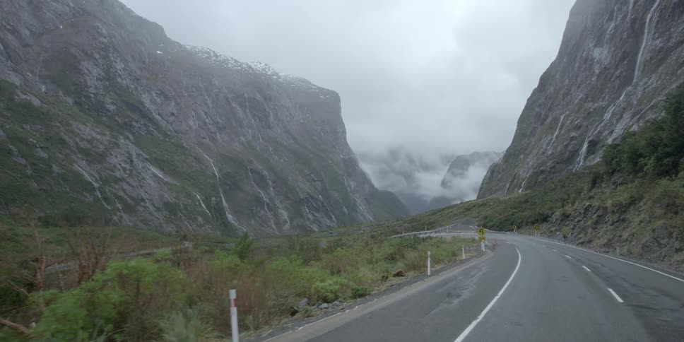 A winding road near mountains