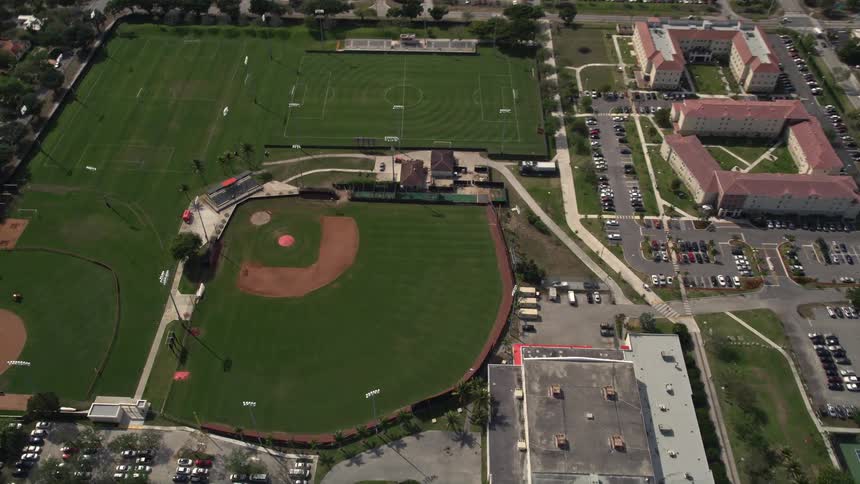 An aerial view of baseball and soccer fields at Barry University Miami Shores Florida on a sunny day