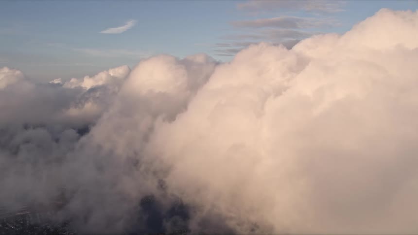 Approaching cloudy sunset over Miami revealing stunning cloud formations over southern Florida