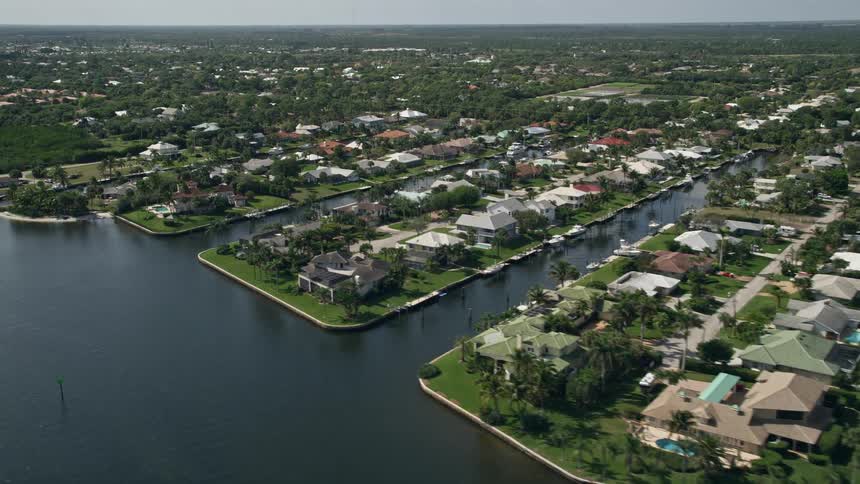 Aerial view of waterfront homes on canals in Hobe Sound Florida