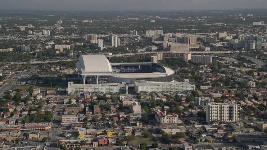 Approaching Marlins Park Stadium home of the Miami Marlins on a sunny Florida day as seen from an aerial perspective