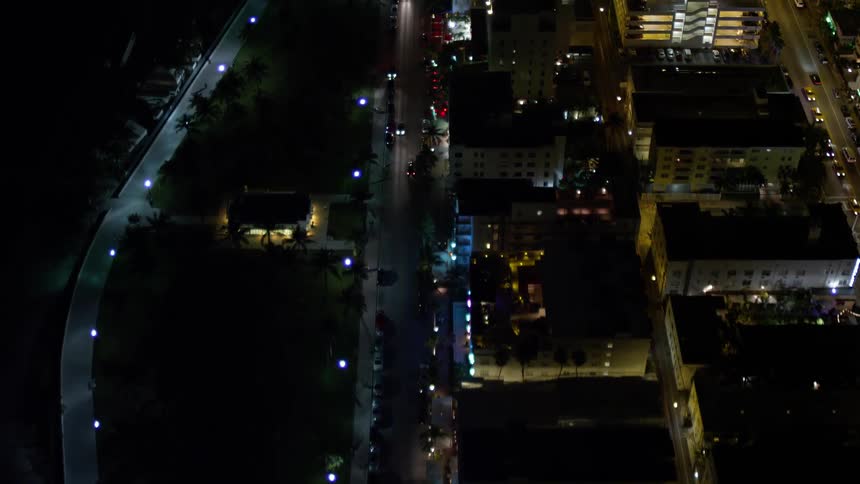Birds eye view of South Beachs Ocean Drive hotels at night in Floridas metropolitan area