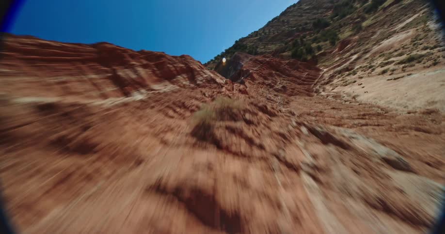 The sky is clear above the mountain