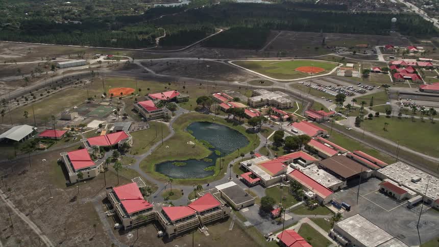 Approaching the Federal Correctional Institution in Miami Florida with a sunny birds eye view