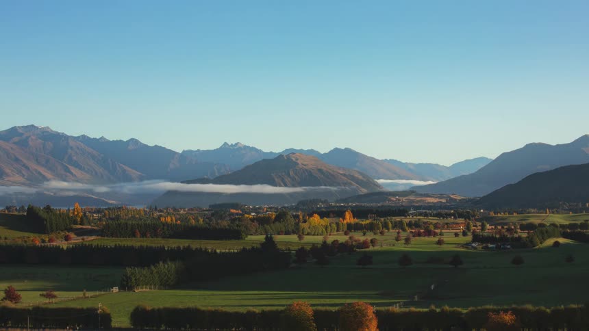 A time lapse captures a gorgeous valley surrounded by mountains