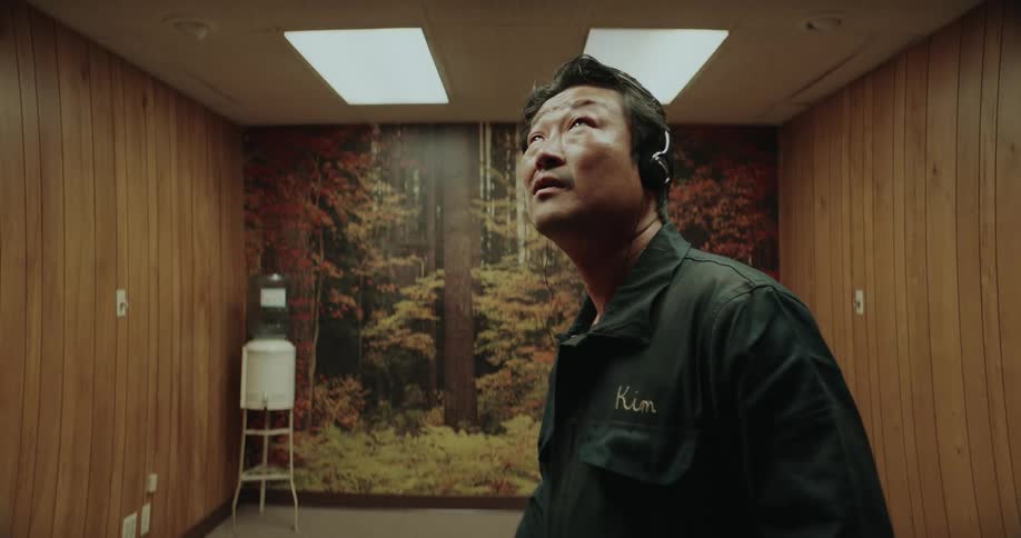 A cinematic lighting of a janitor doing something