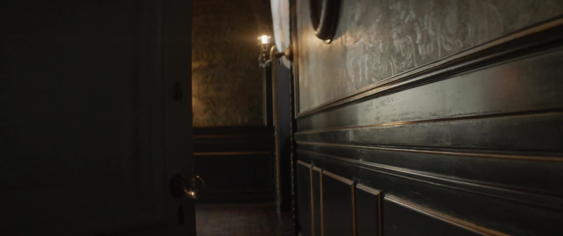 Sconces on a wall shine with light