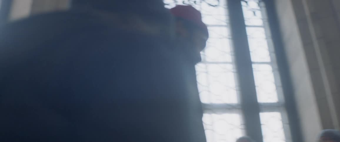 A man races up the staircase