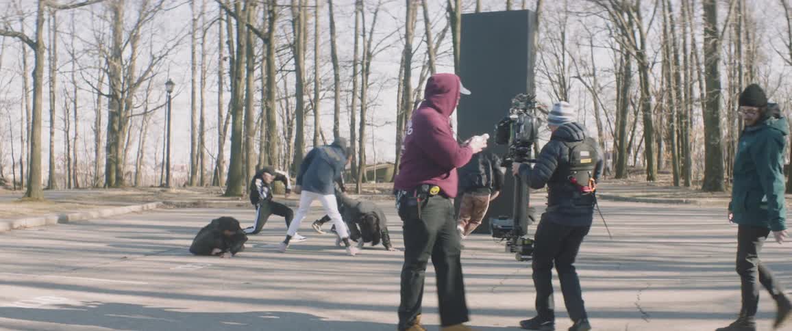 A group do a choreographed dance routine
