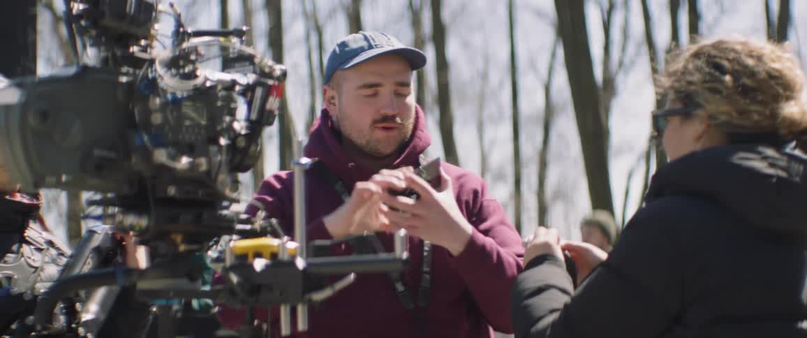 People are working together filming