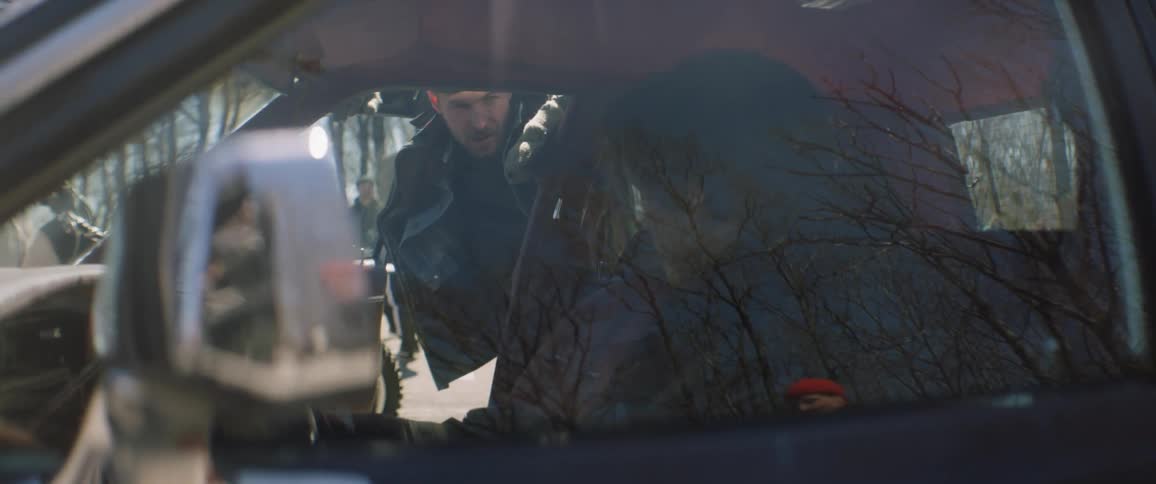 A man talks to a driver