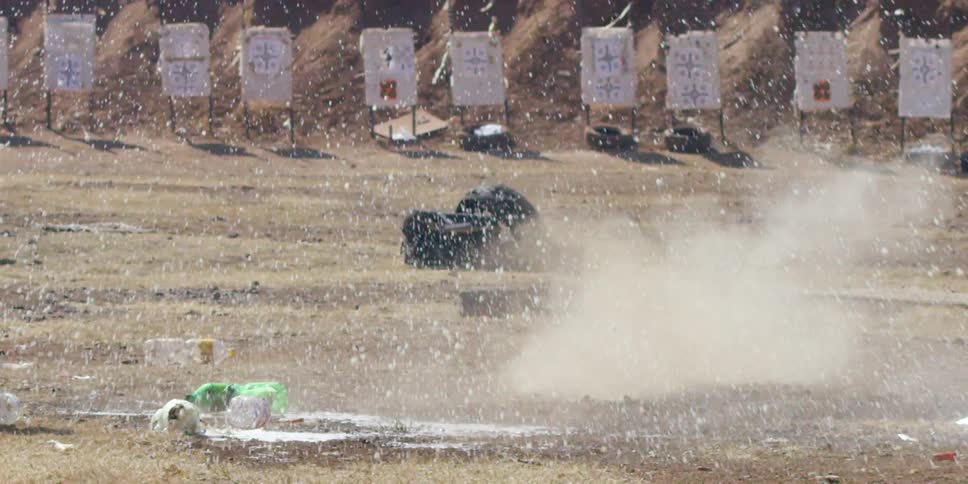 Two water bottles exploding